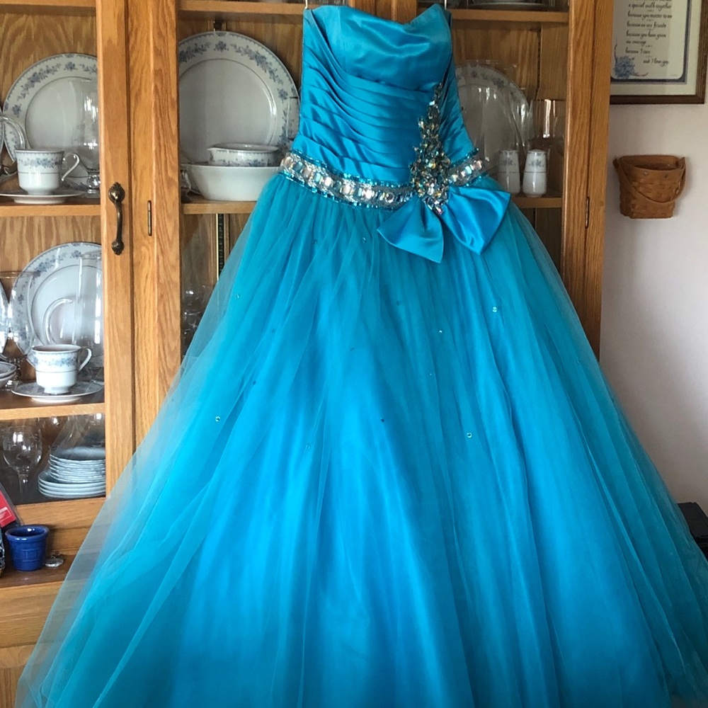 Strapless light blue corset ball gown.